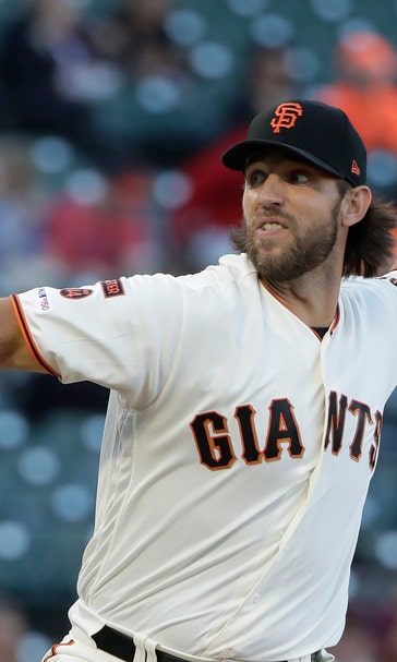Bumgarner strikes out 11 in Giants' 4-2 win over Rockies